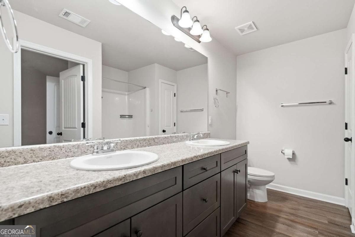 4 bedroom, 3 bathroom, 1,632 sq ft single family residence for sale at 213 Camellia Court LOT 51, Jackson, GA 30233 — photo 10