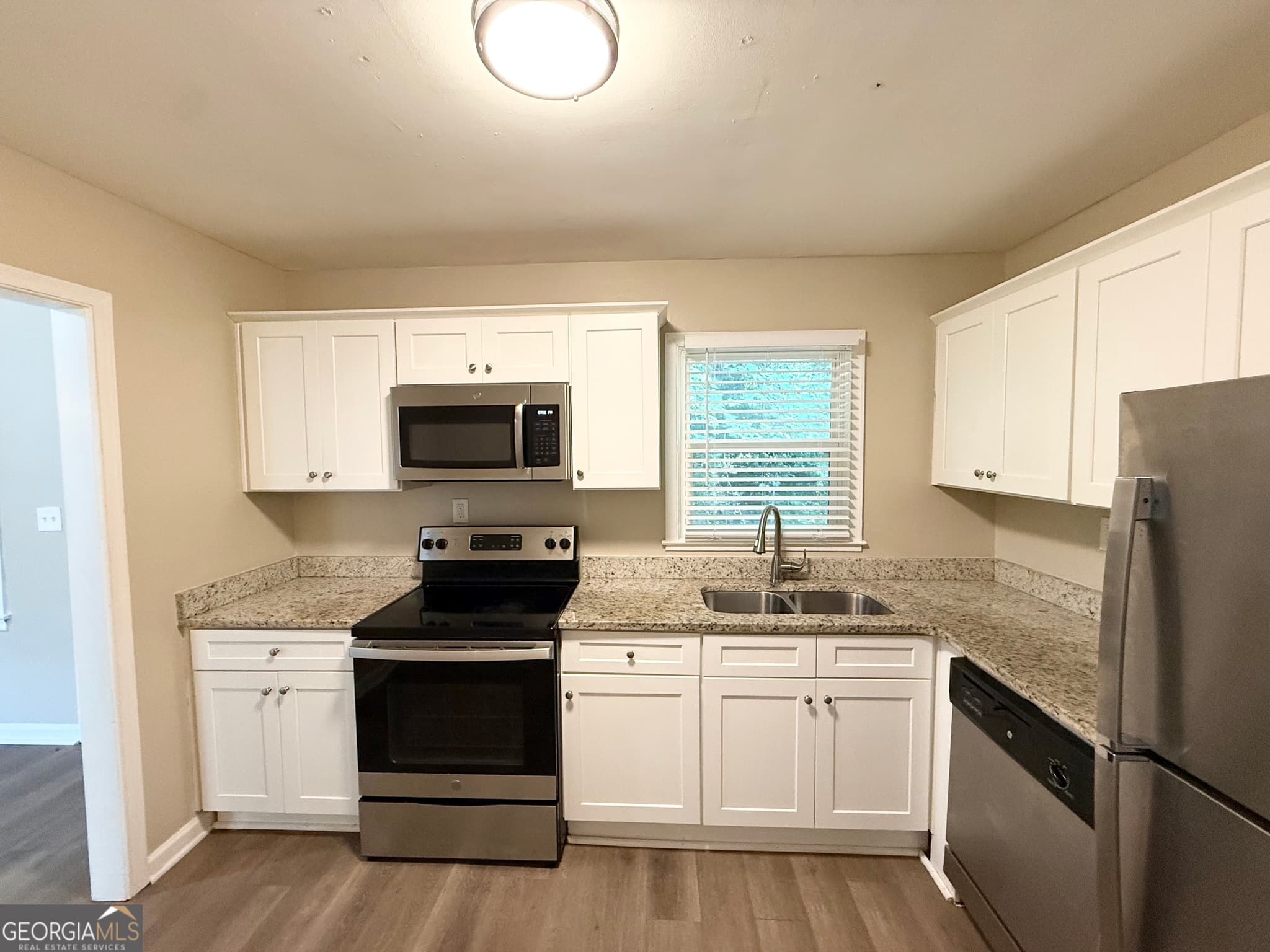 4 bedroom, 2 bathroom, 2,277 sq ft single family residence for sale at 1984 BRENDA Drive, Austell, GA 30168 — photo 4