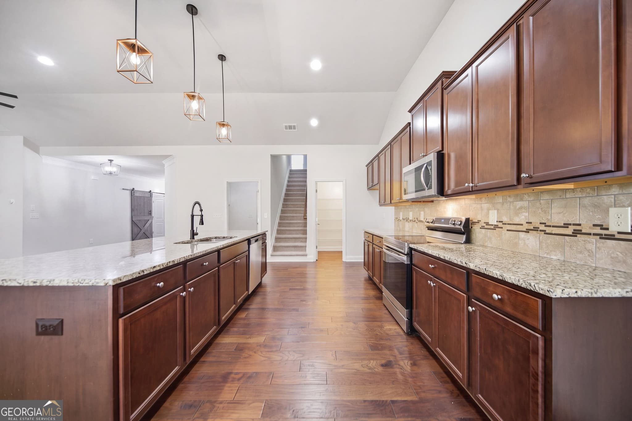 4 bedroom, 3 bathroom, 2,440 sq ft single family residence for sale at 6372 Spring Cove Drive, Flowery Branch, GA 30542 — photo 6