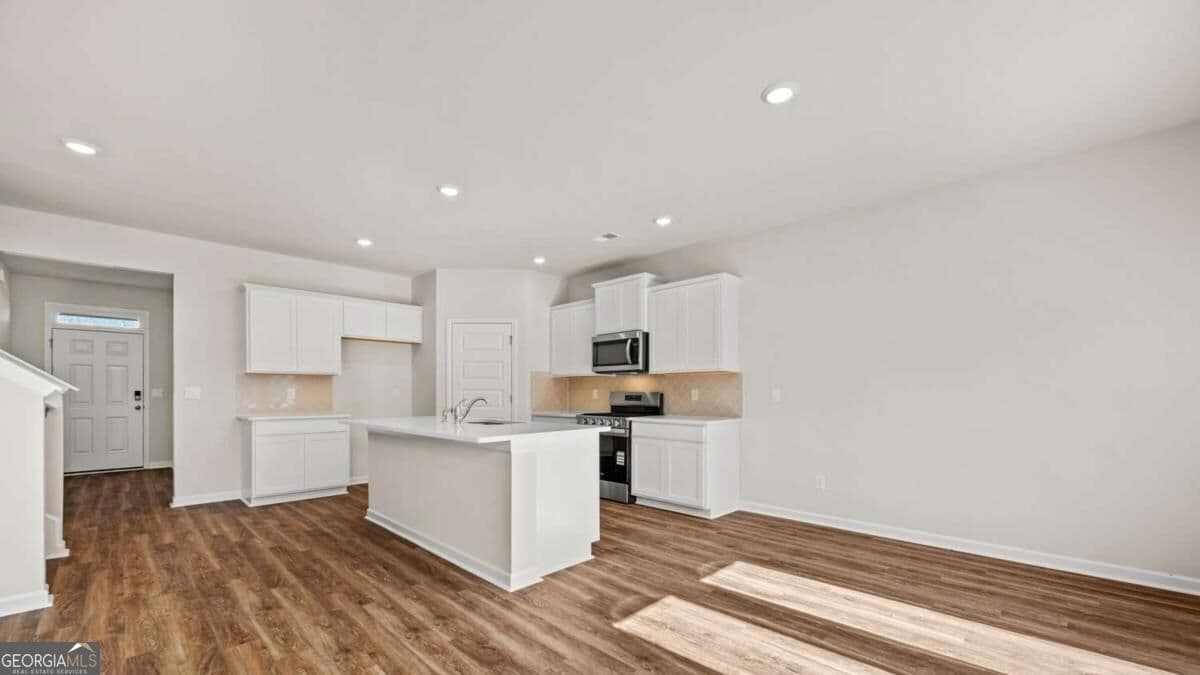 5 bedroom, 3 bathroom single family residence for sale at 305 Faulkner Street, Stockbridge, GA 30281 — photo 6