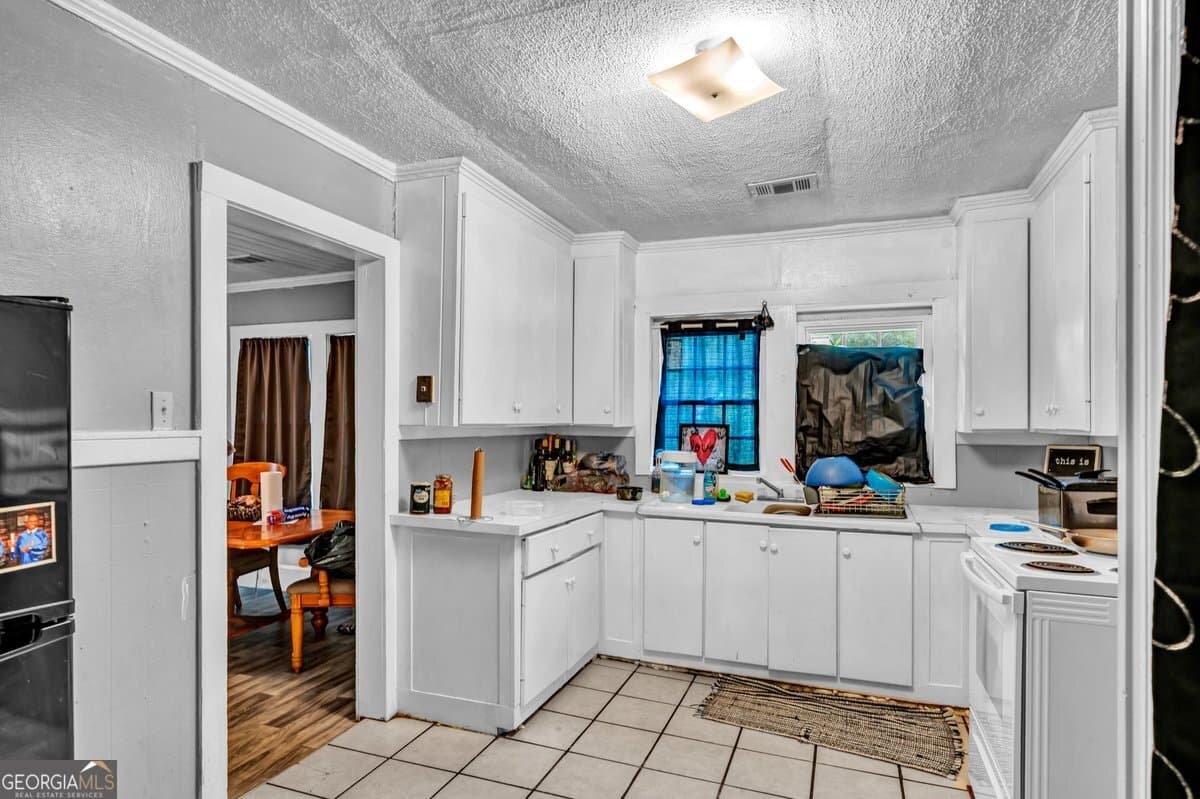 4 bedroom, 2 bathroom, 1,561 sq ft single family residence for sale at 316 E 23rd Avenue, Cordele, GA 31015 — photo 7