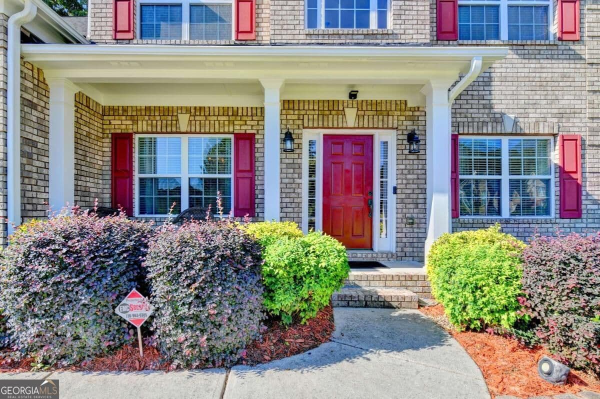4 bedroom, 2 bathroom, 2,718 sq ft single family residence for sale at 830 Wisteria View Court, Dacula, GA 30019 — photo 2