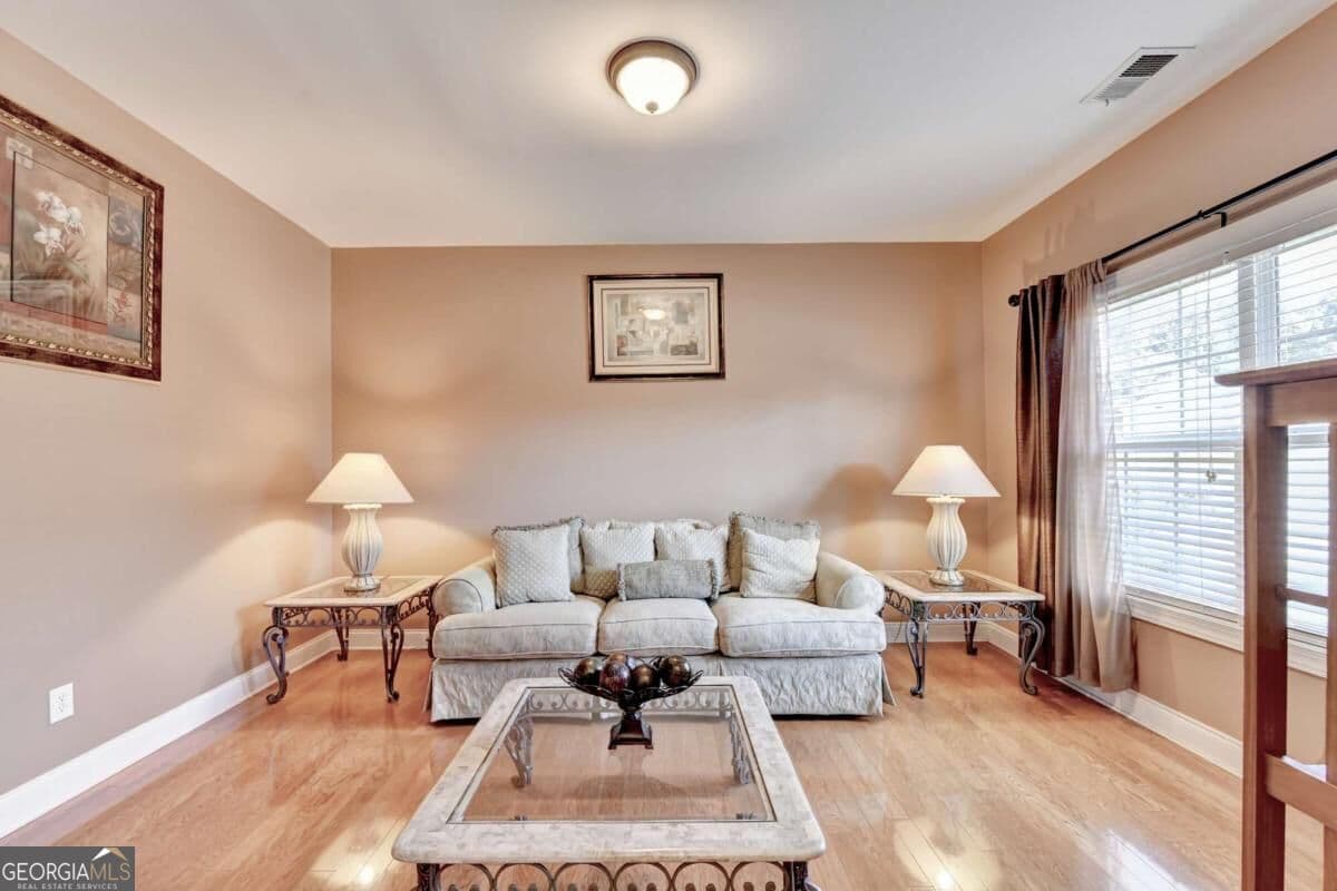 4 bedroom, 2 bathroom, 2,718 sq ft single family residence for sale at 830 Wisteria View Court, Dacula, GA 30019 — photo 5