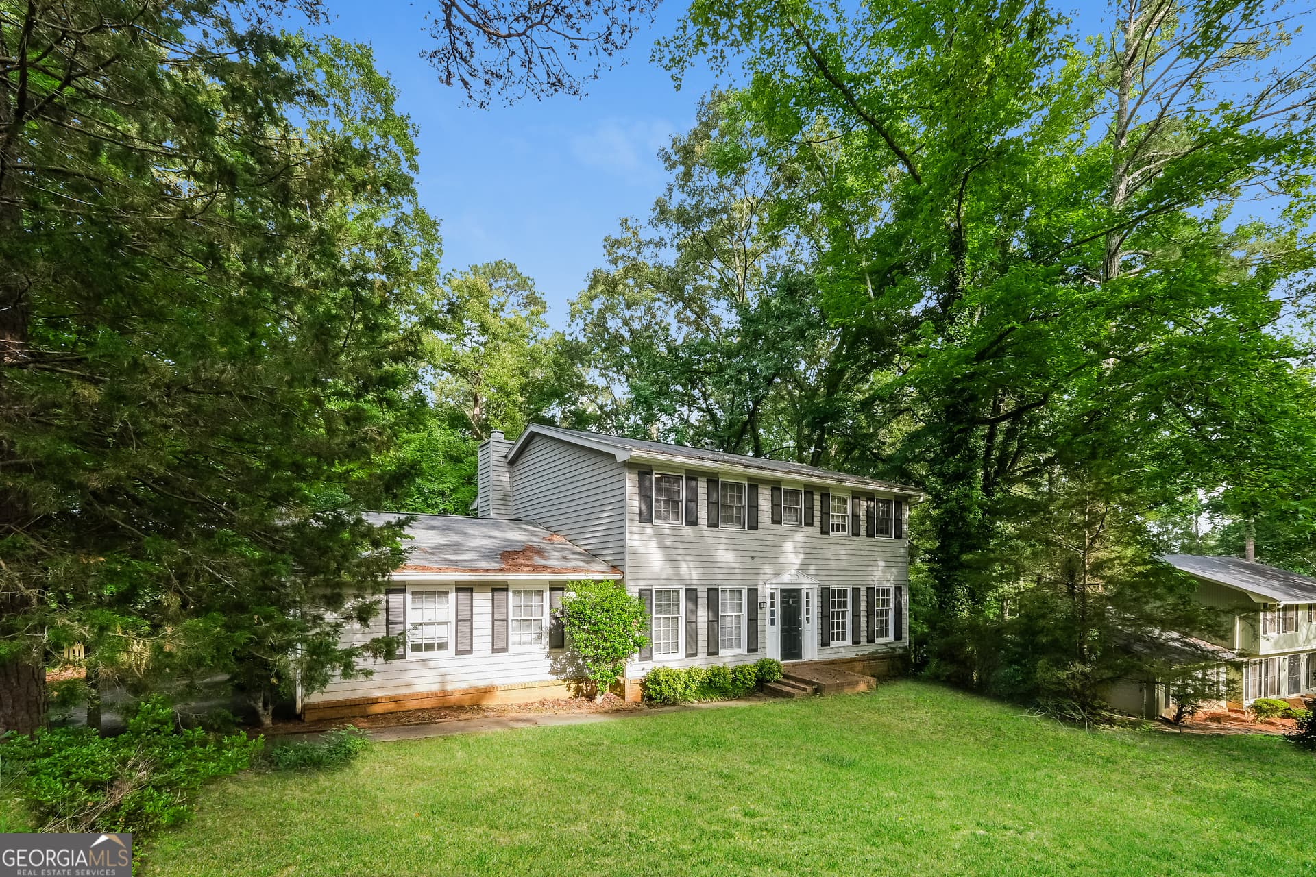4 bedroom, 2.5 bathroom, 2,178 sq ft single family residence for sale at 1672 Briarbend Court, Stone Mountain, GA 30088 — photo 2