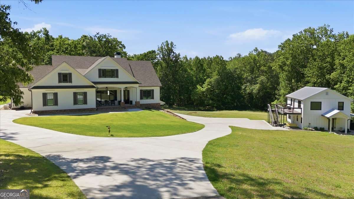 5 bedroom, 6 bathroom, 6,071 sq ft single family residence for sale at 395 Heard Road, Canton, GA 30114 — photo 3