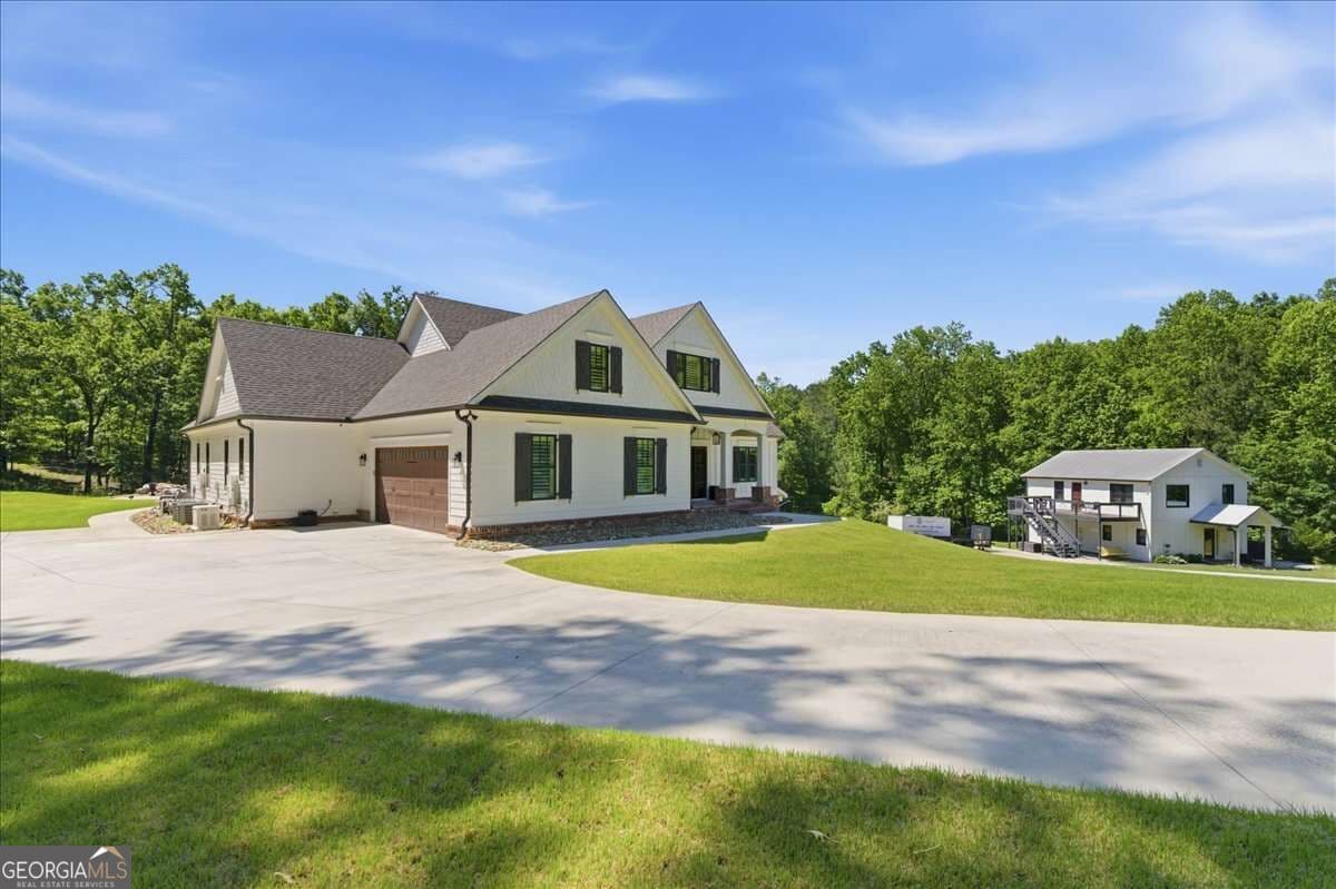5 bedroom, 6 bathroom, 6,071 sq ft single family residence for sale at 395 Heard Road, Canton, GA 30114
