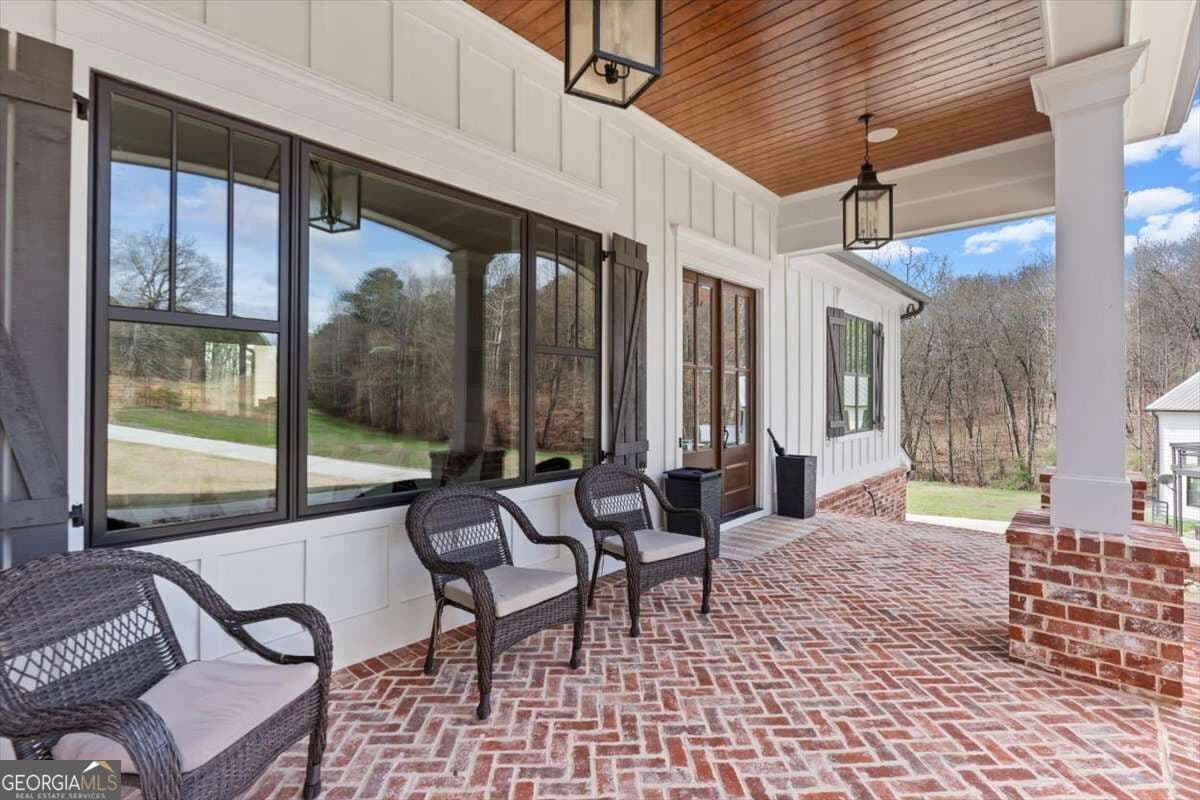 5 bedroom, 6 bathroom, 6,071 sq ft single family residence for sale at 395 Heard Road, Canton, GA 30114 — photo 4