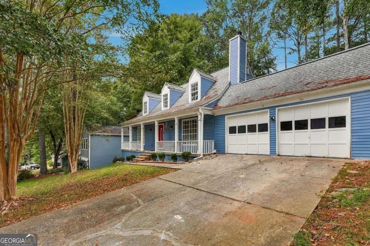 3 bedroom, 2 bathroom, 1,612 sq ft single family residence for sale at 2170 Laurel Mill Way, Roswell, GA 30076 — photo 2