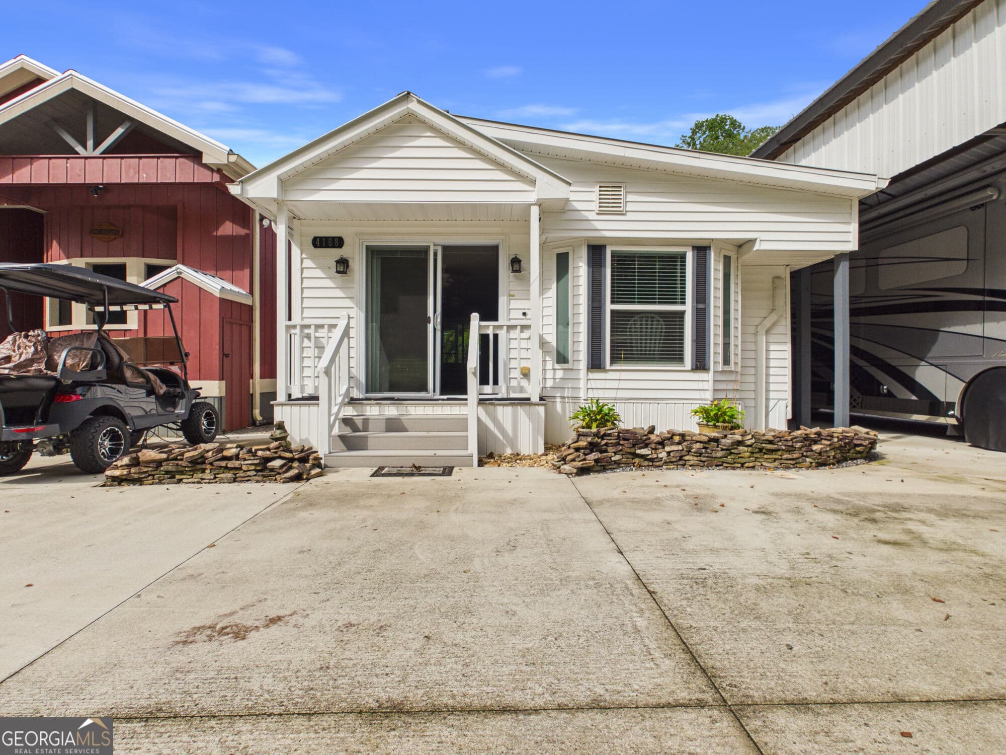 1 bedroom, 1.5 bathroom, 360 sq ft manufactured home,mixed use for sale at 4167 & 4168 Riverbank Run, Hiawassee, GA 30546 — photo 1 of 48