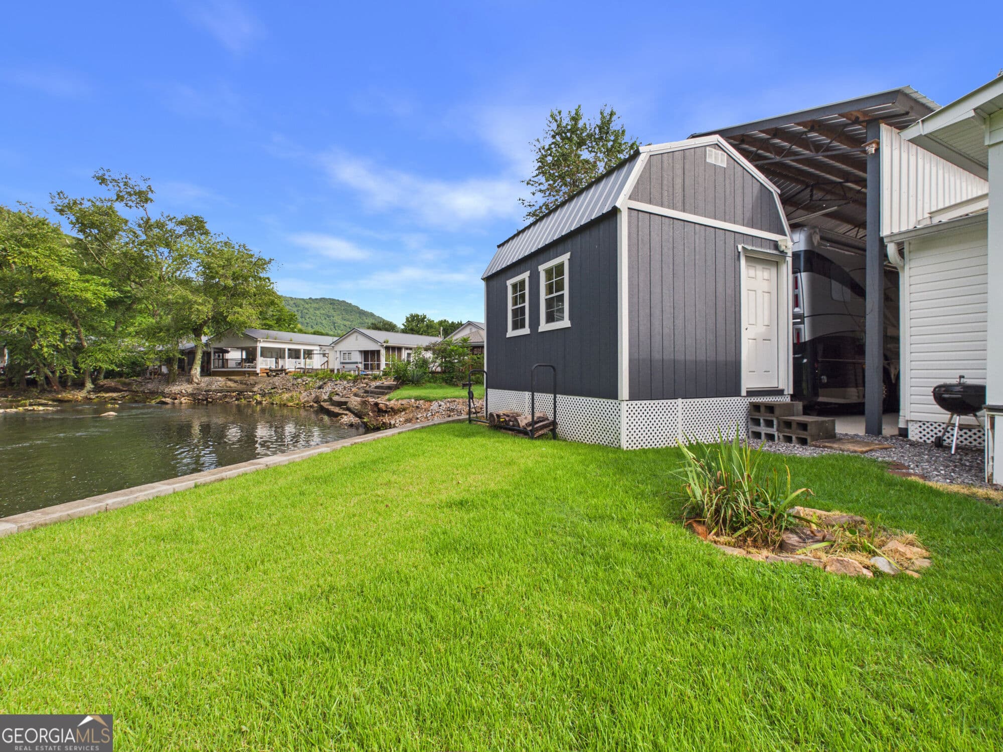 1 bedroom, 1.5 bathroom, 360 sq ft manufactured home,mixed use for sale at 4167 & 4168 Riverbank Run, Hiawassee, GA 30546 — photo 4