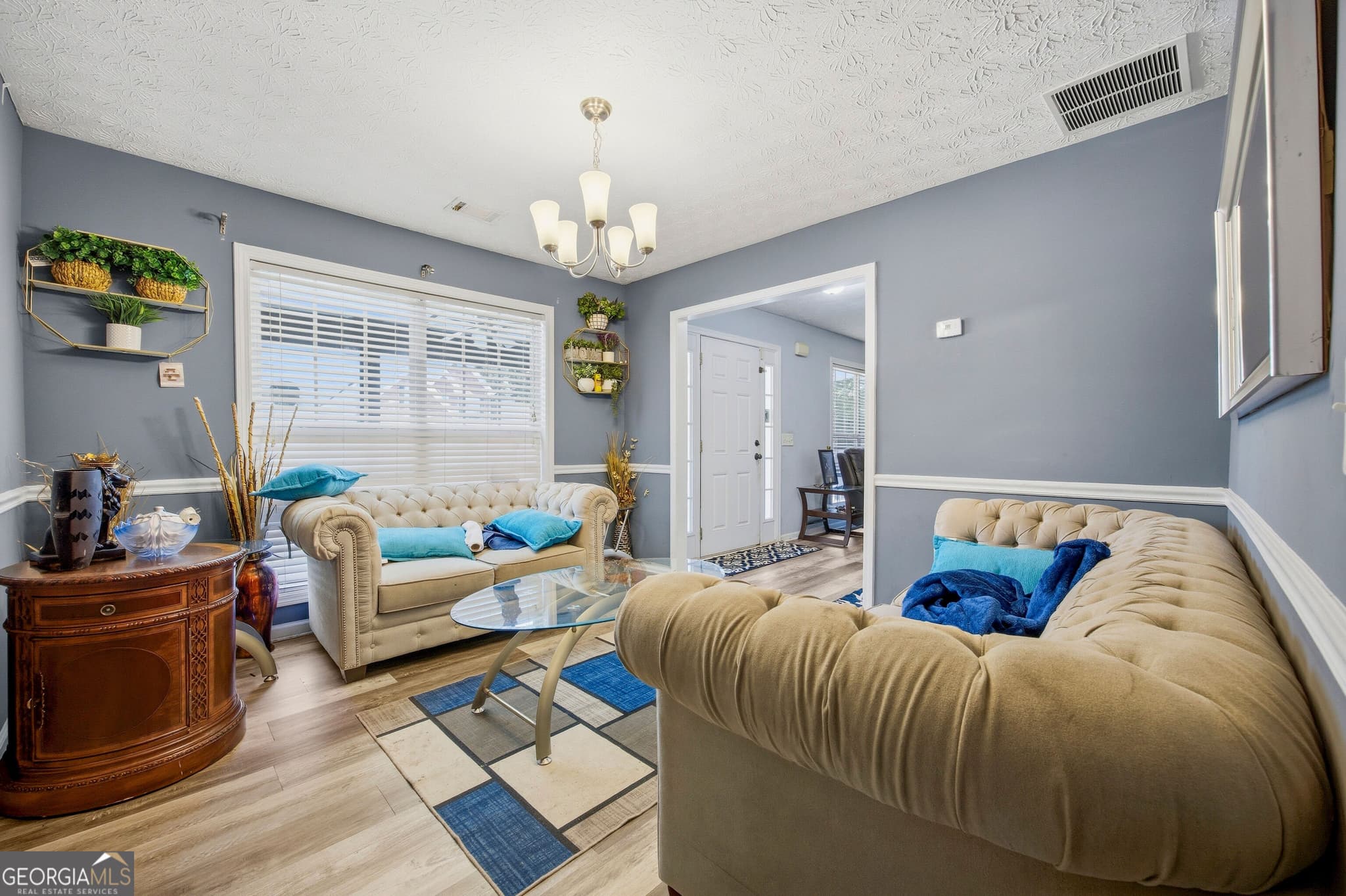 4 bedroom, 3.5 bathroom, 3,024 sq ft single family residence for sale at 595 Castlebrooke Drive, Lawrenceville, GA 30045 — photo 3