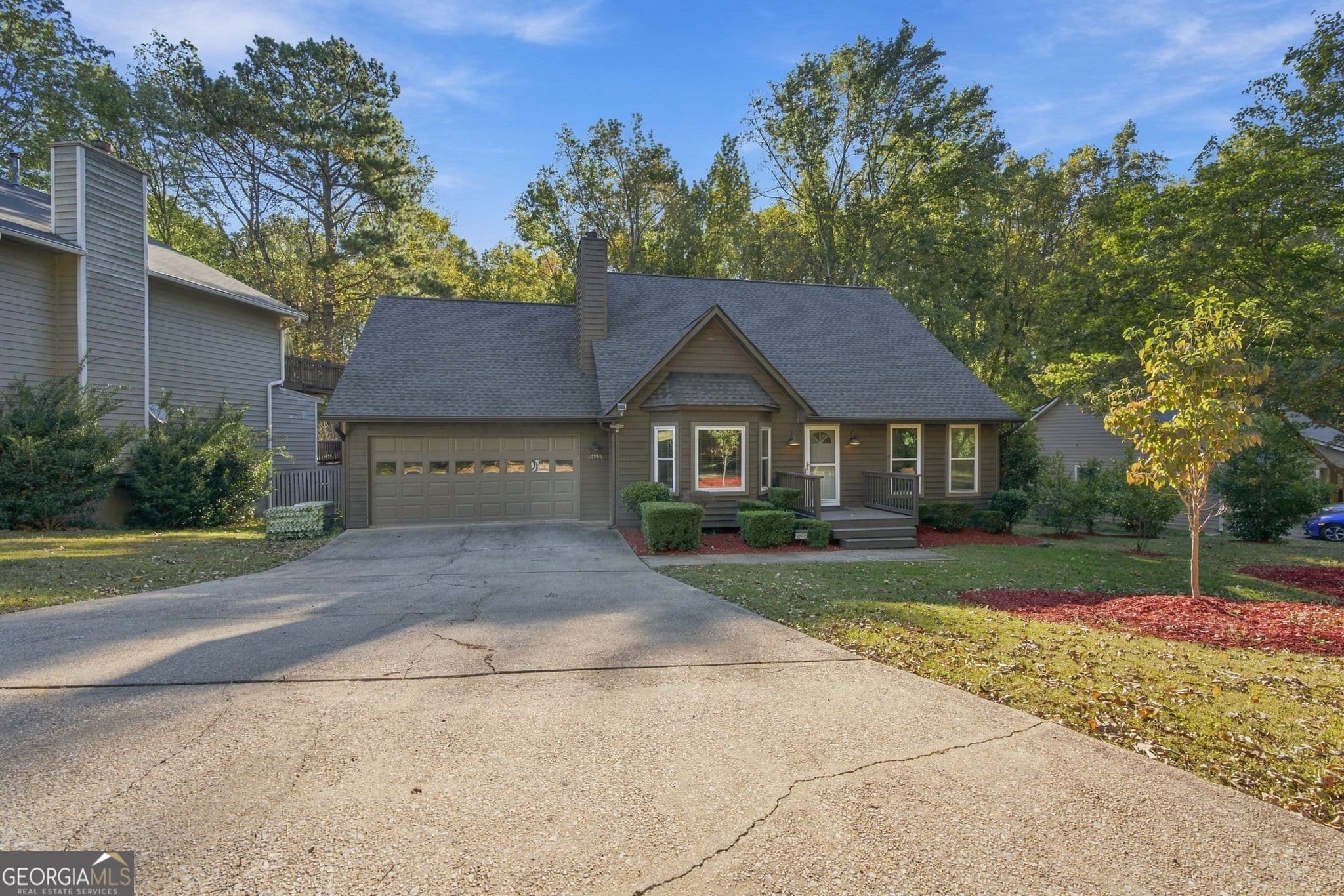 3 bedroom, 2 bathroom, 2,243 sq ft single family residence for sale at 10995 Indian Village Drive, Johns Creek, GA 30022