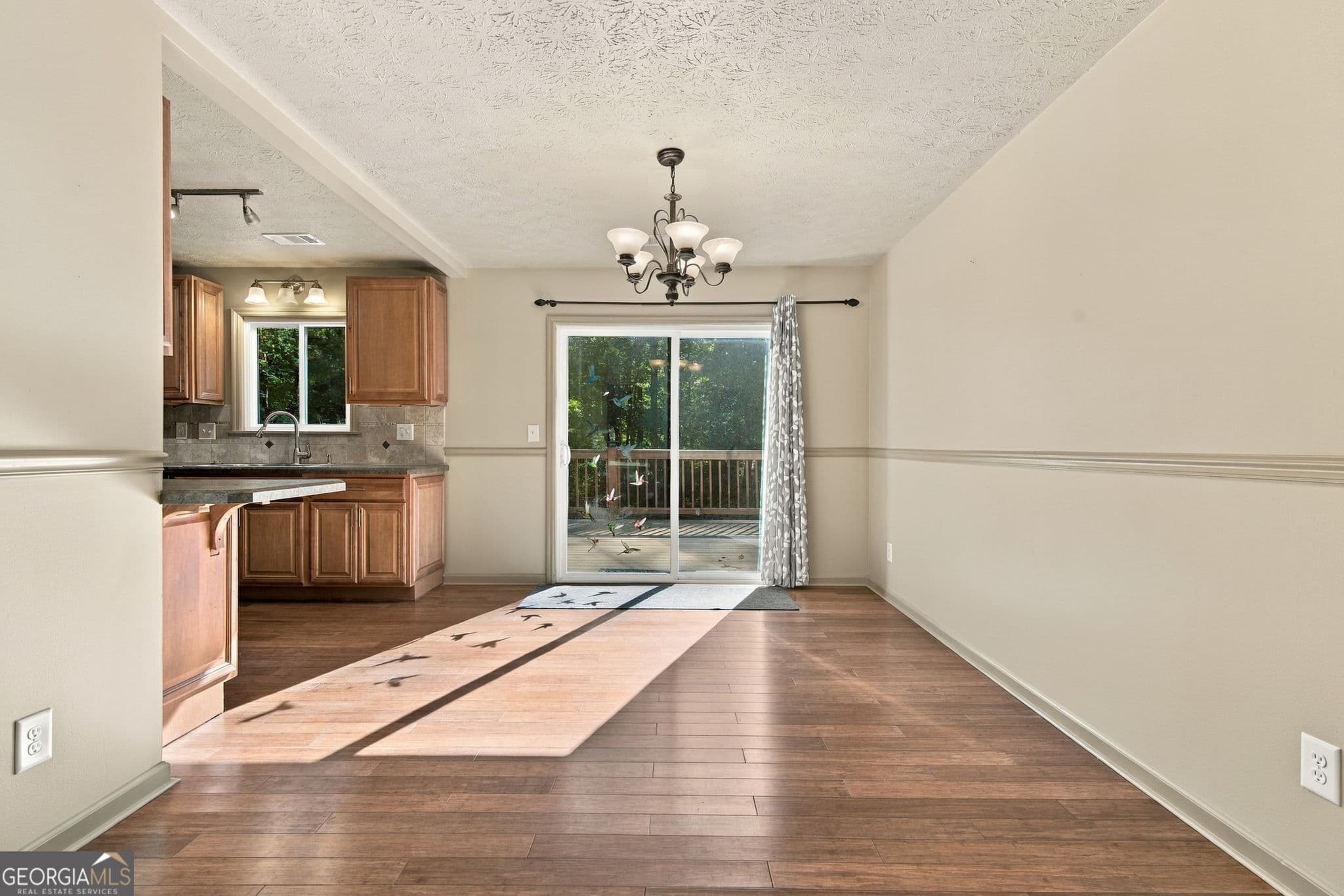 3 bedroom, 2 bathroom, 2,243 sq ft single family residence for sale at 10995 Indian Village Drive, Johns Creek, GA 30022 — photo 9
