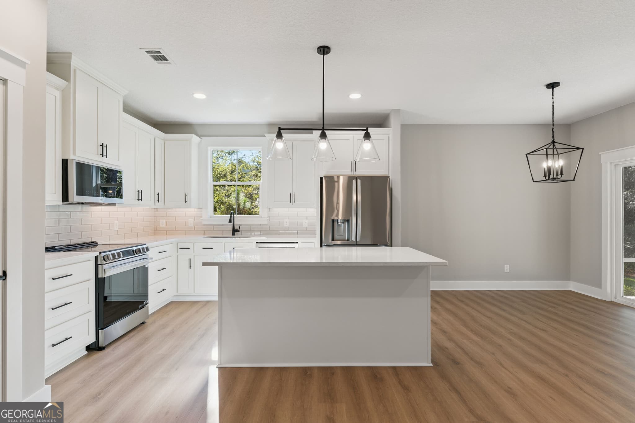 4 bedroom, 4.5 bathroom, 3,411 sq ft single family residence for sale at 186 Blue Heron Trail, Waverly, GA 31565 — photo 7