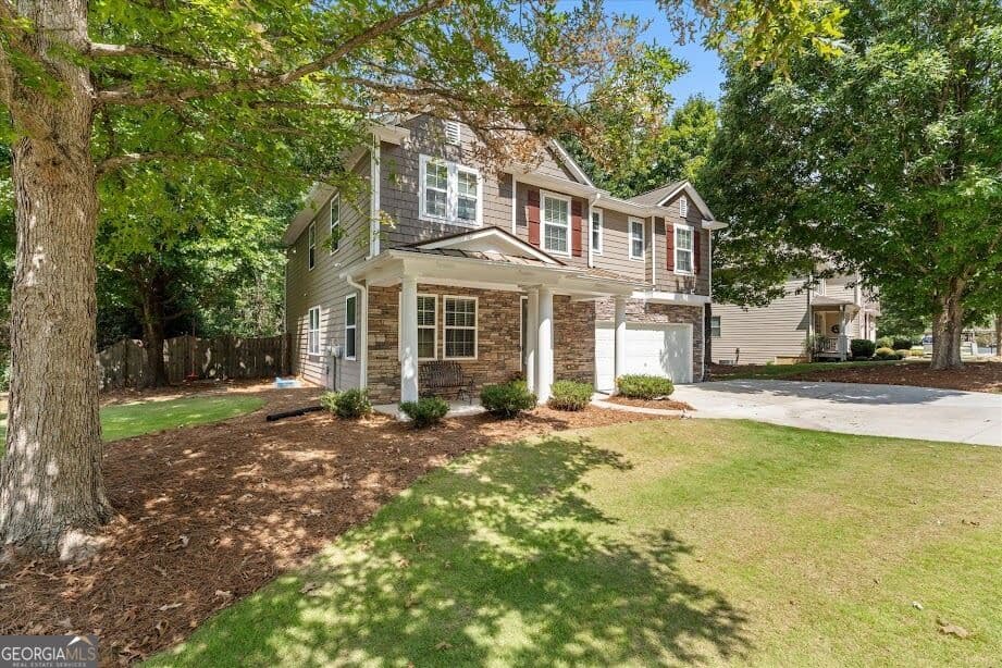 4 bedroom, 2.5 bathroom, 3,171 sq ft single family residence for sale at 166 Westminster Way, Newnan, GA 30263 — photo 2