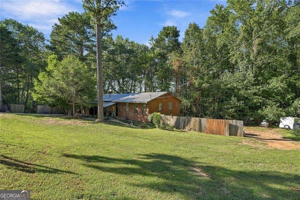 4 bedroom, 3 bathroom, 2,016 sq ft single family residence for sale at 6430 Pine Ridge Circle, Cumming, GA 30041 — photo 2