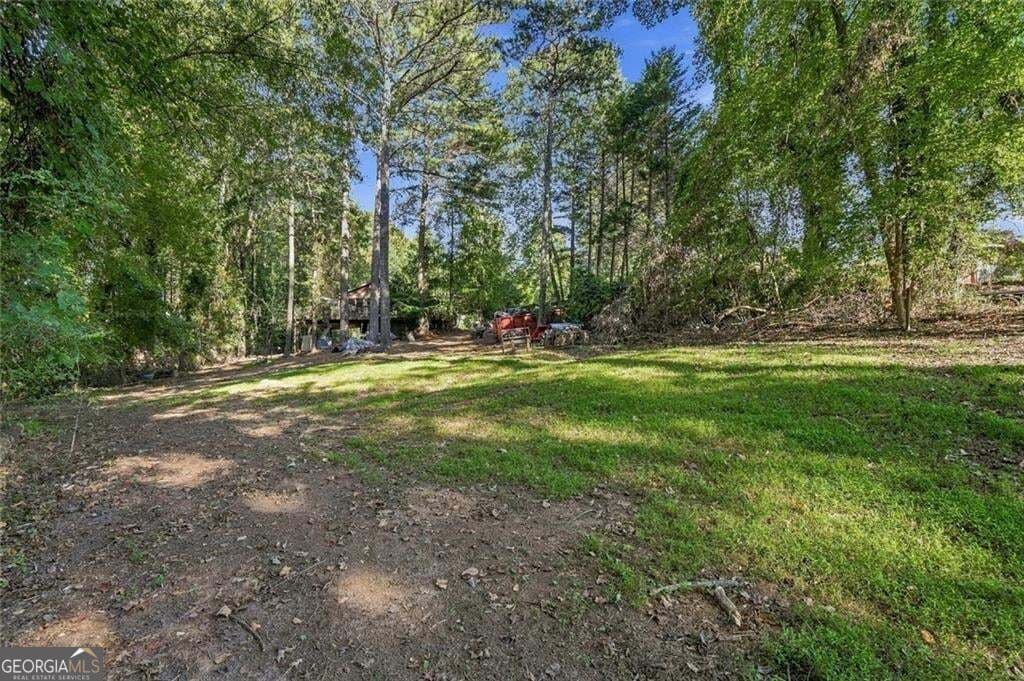 4 bedroom, 3 bathroom, 2,016 sq ft single family residence for sale at 6430 Pine Ridge Circle, Cumming, GA 30041 — photo 6