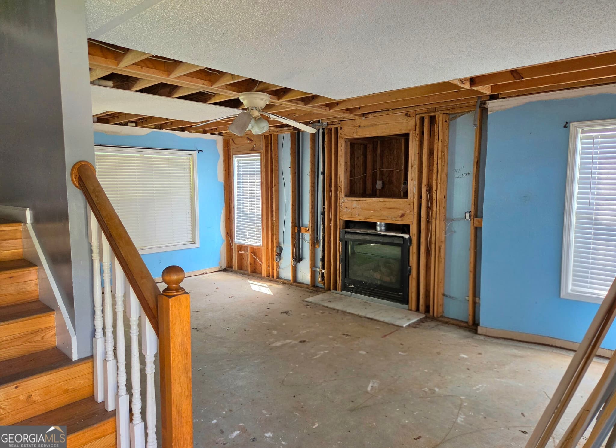 4 bedroom, 2.5 bathroom, 1,948 sq ft single family residence for sale at 309 Madison Avenue, Hampton, GA 30228 — photo 2