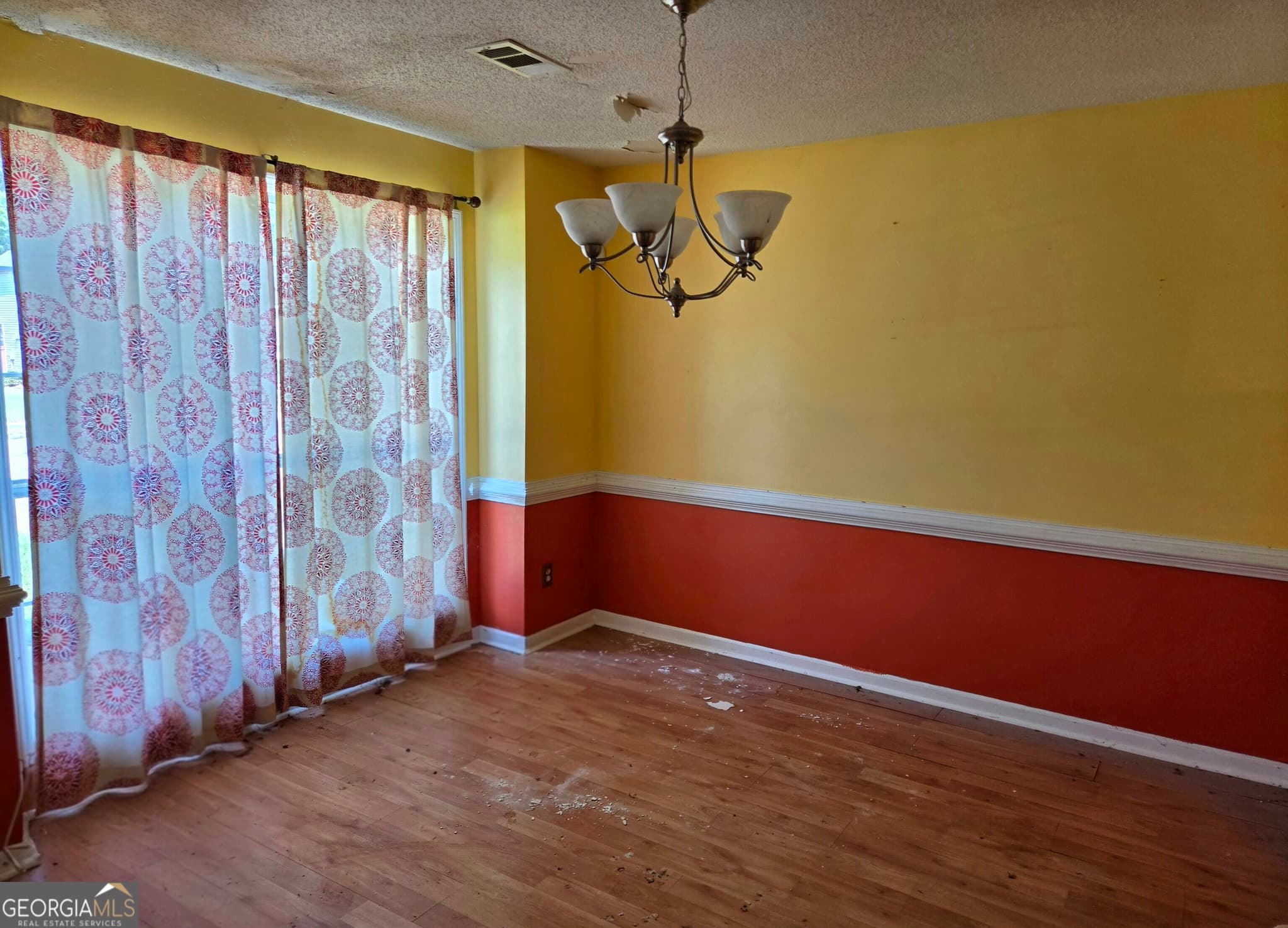 4 bedroom, 2.5 bathroom, 1,948 sq ft single family residence for sale at 309 Madison Avenue, Hampton, GA 30228 — photo 3
