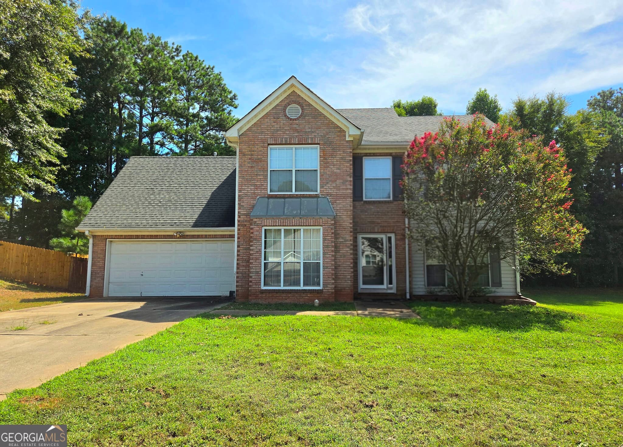 4 bedroom, 2.5 bathroom, 1,948 sq ft single family residence for sale at 309 Madison Avenue, Hampton, GA 30228