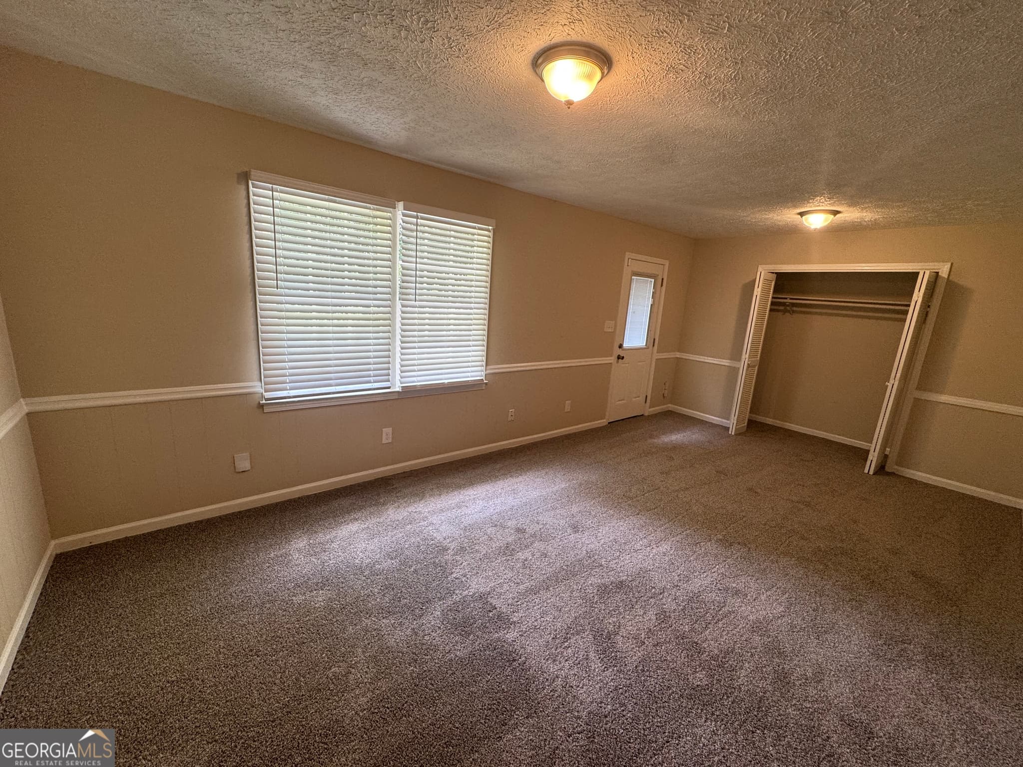 5 bedroom, 2.5 bathroom, 1,922 sq ft single family residence for sale at 8347 Union Grove Road, Lithonia, GA 30058 — photo 6