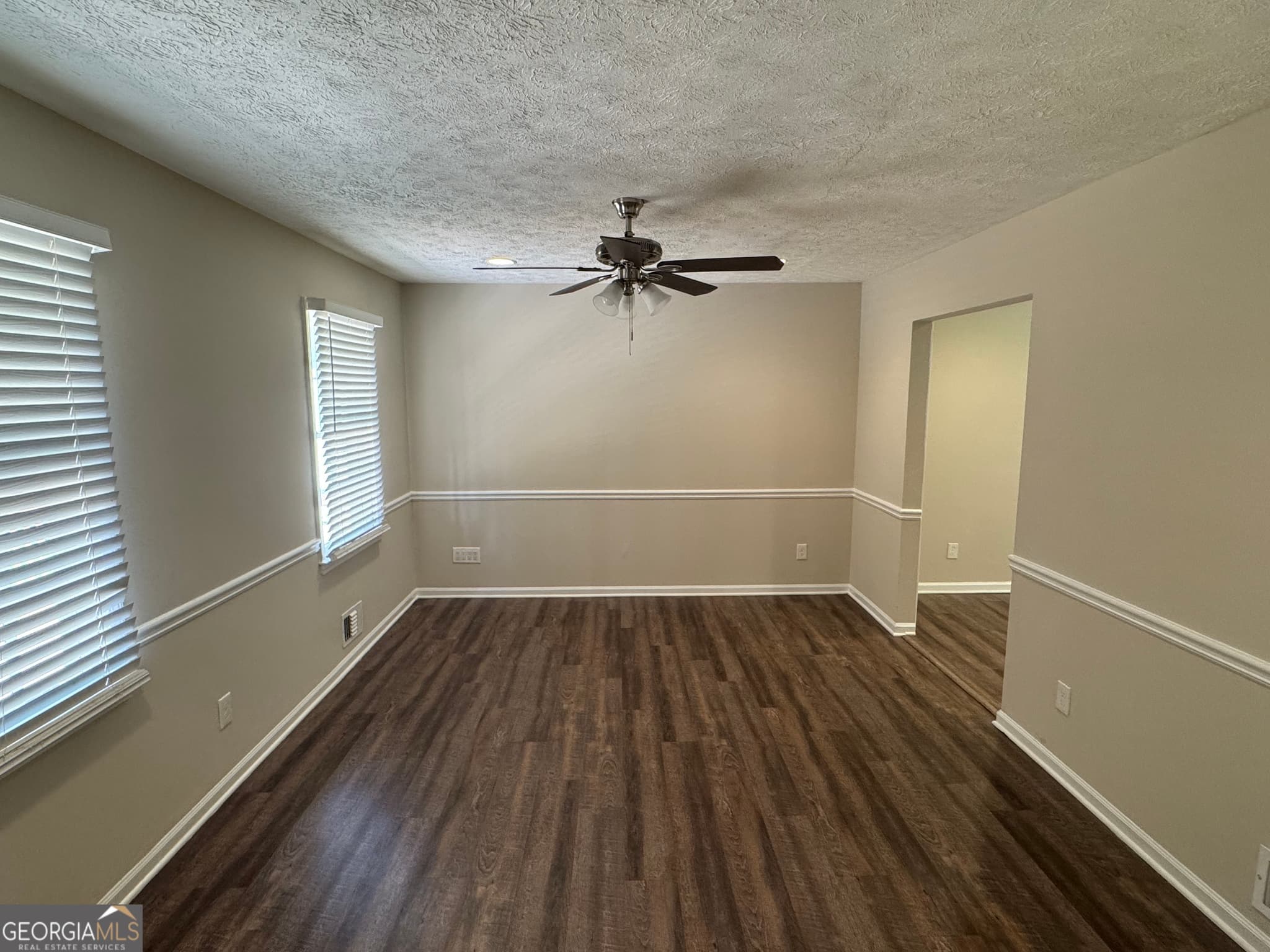 5 bedroom, 2.5 bathroom, 1,922 sq ft single family residence for sale at 8347 Union Grove Road, Lithonia, GA 30058 — photo 4