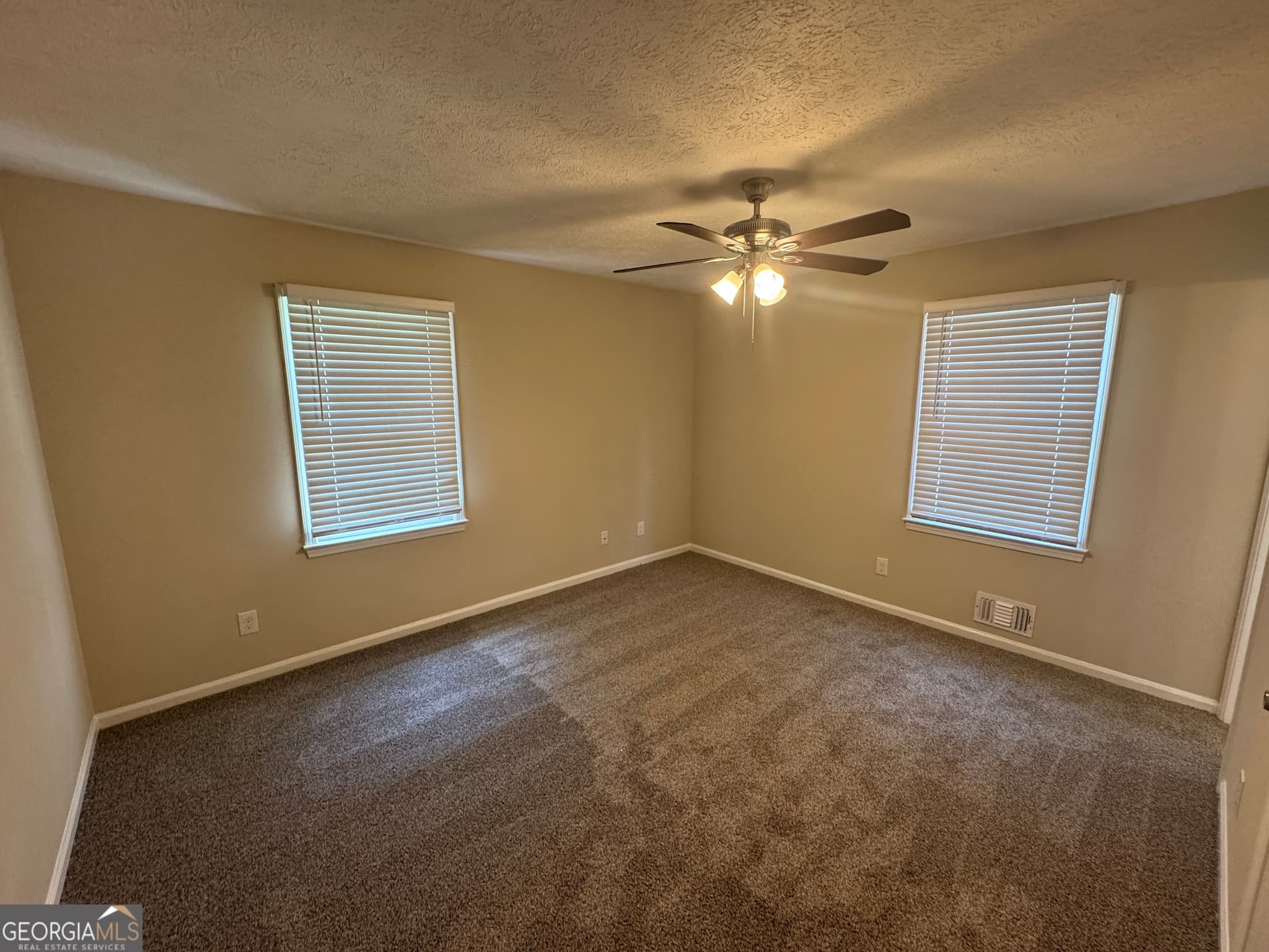 5 bedroom, 2.5 bathroom, 1,922 sq ft single family residence for sale at 8347 Union Grove Road, Lithonia, GA 30058 — photo 8