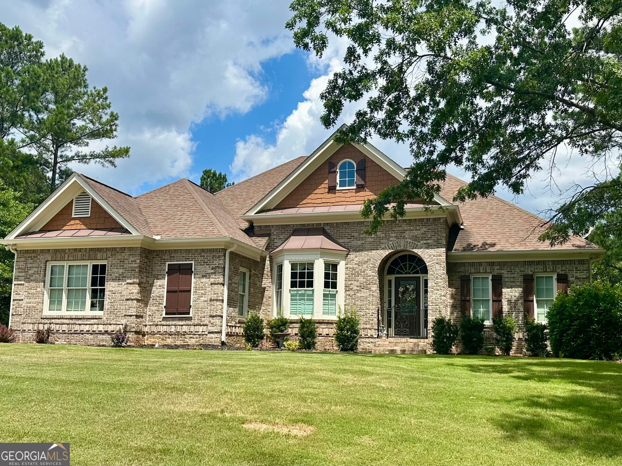 6 bedroom, 4.5 bathroom, 5,564 sq ft single family residence for sale at 103 Lumpkin Way, Canton, GA 30115 — photo 2