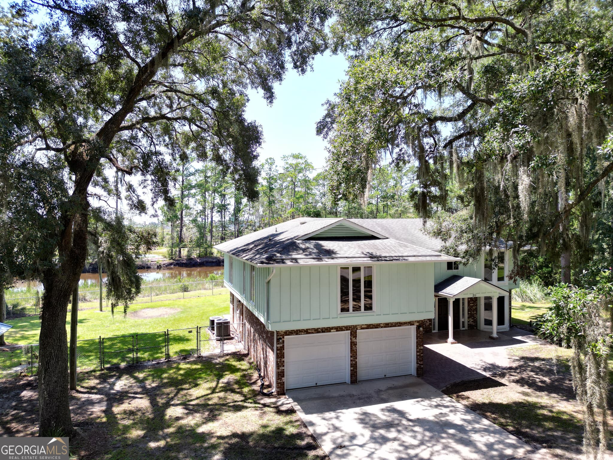 3 bedroom, 2.5 bathroom, 3,438 sq ft single family residence for sale at 211 Tideland Drive, Midway, GA 31320 — photo 6