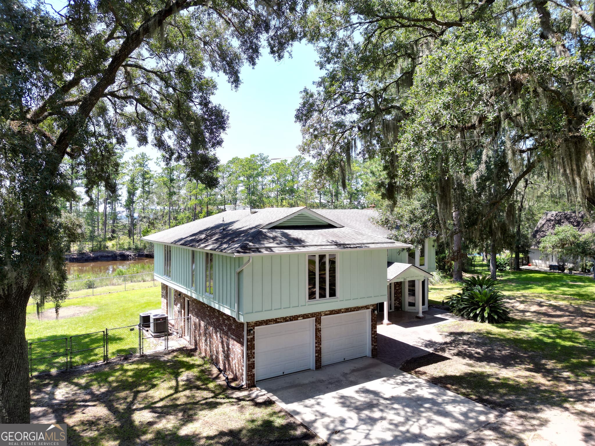 3 bedroom, 2.5 bathroom, 3,438 sq ft single family residence for sale at 211 Tideland Drive, Midway, GA 31320 — photo 4