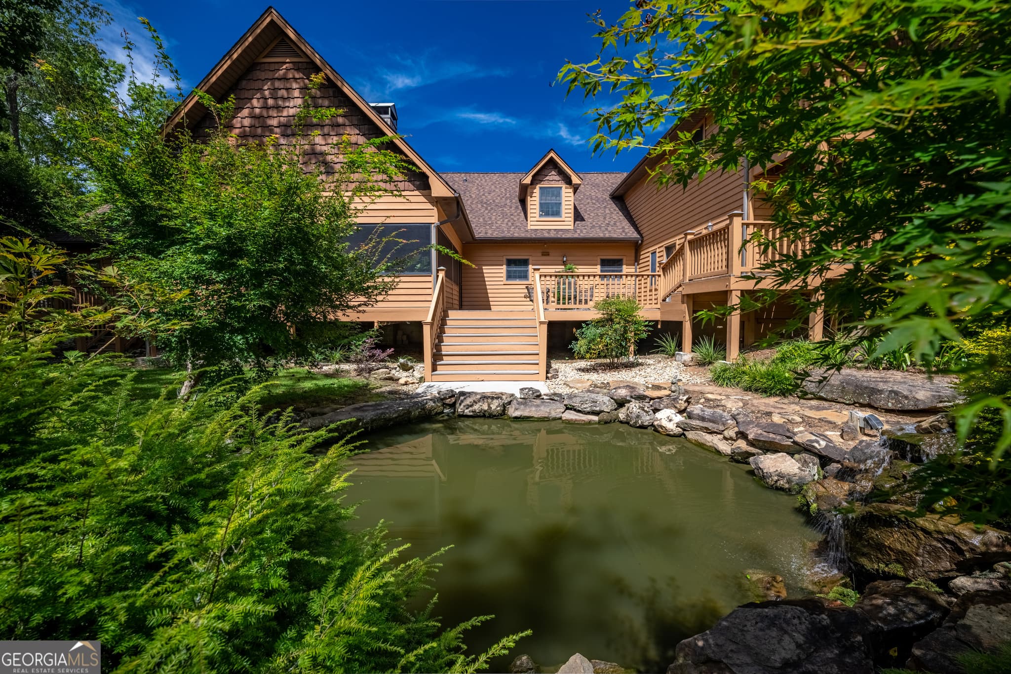 4 bedroom, 4.5 bathroom, 5,094 sq ft single family residence for sale at 198 Stonecreek Drive, Franklin, NC 28734 — photo 2
