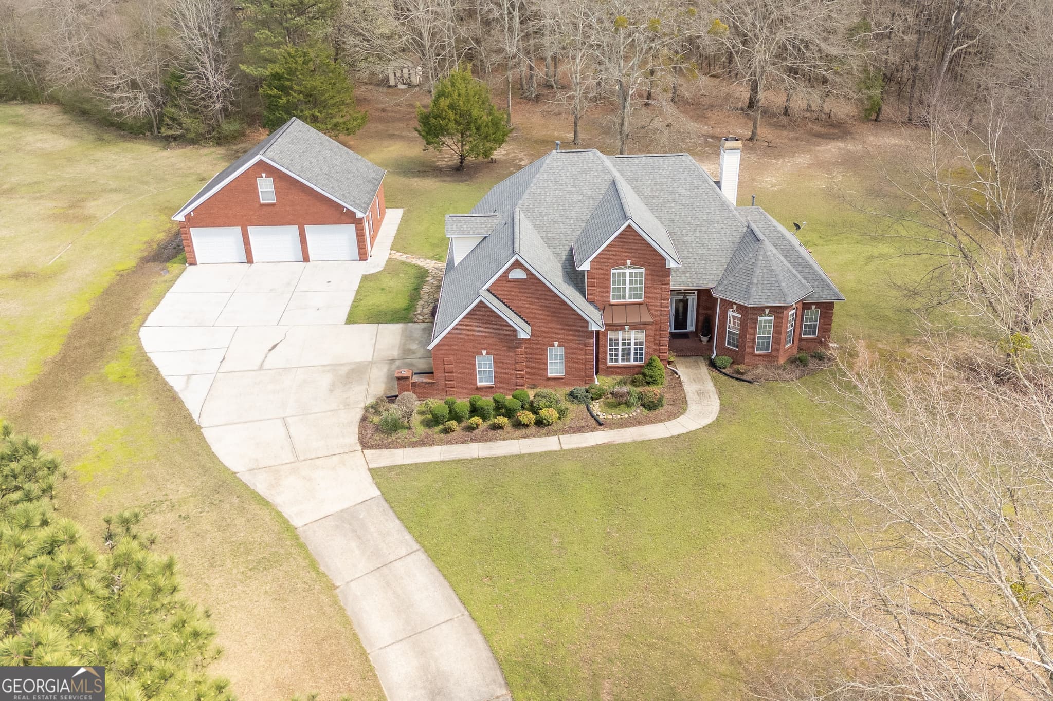 4 bedroom, 3.5 bathroom, 2,769 sq ft single family residence for sale at 2101 NE Indian Shoals Drive, Loganville, GA 30052 — photo 6