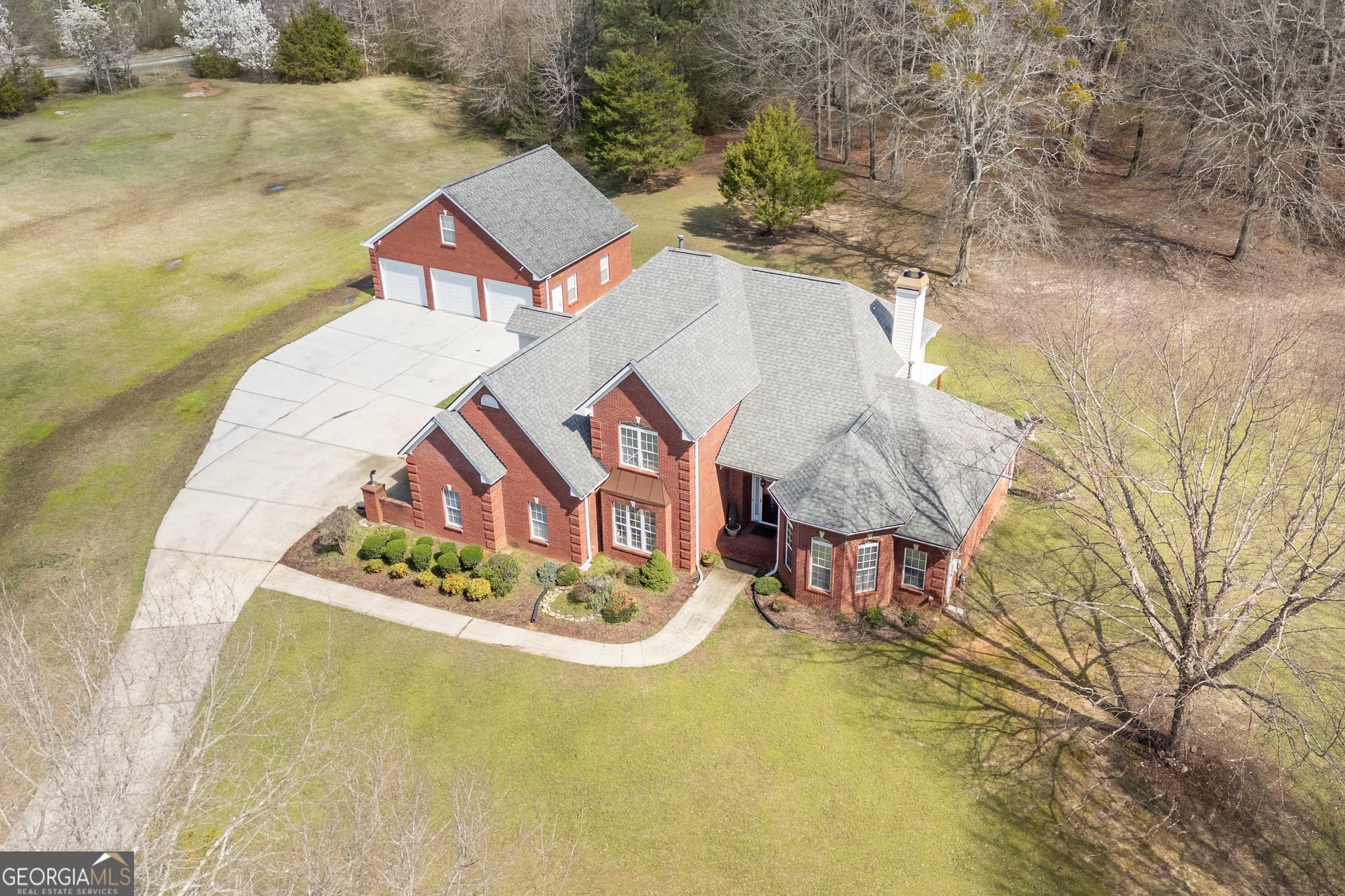 4 bedroom, 3.5 bathroom, 2,769 sq ft single family residence for sale at 2101 NE Indian Shoals Drive, Loganville, GA 30052 — photo 9