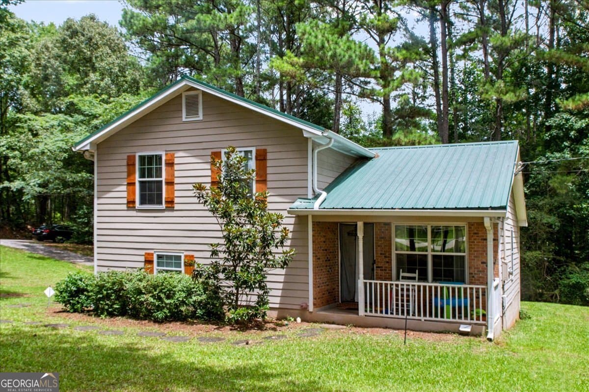 4 bedroom, 2 bathroom, 1,465 sq ft single family residence for sale at 1580 King Mill Road, Mcdonough, GA 30252 — photo 2