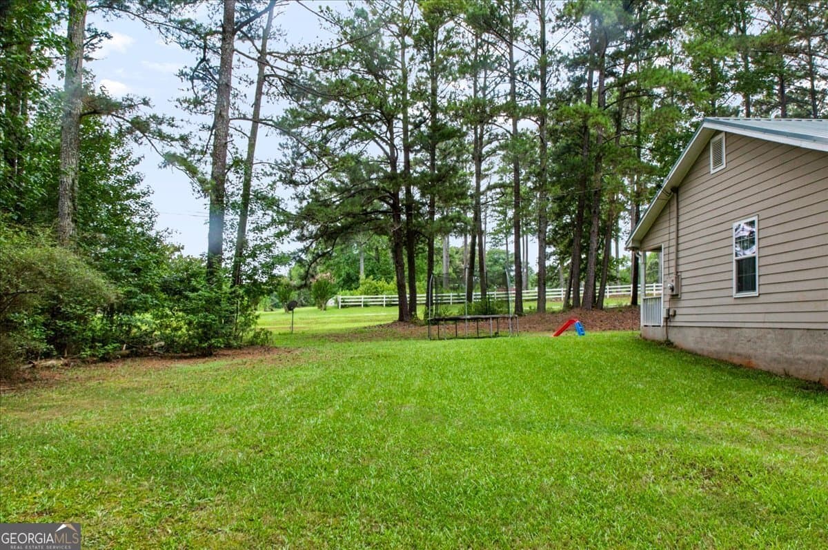 4 bedroom, 2 bathroom, 1,465 sq ft single family residence for sale at 1580 King Mill Road, Mcdonough, GA 30252 — photo 6