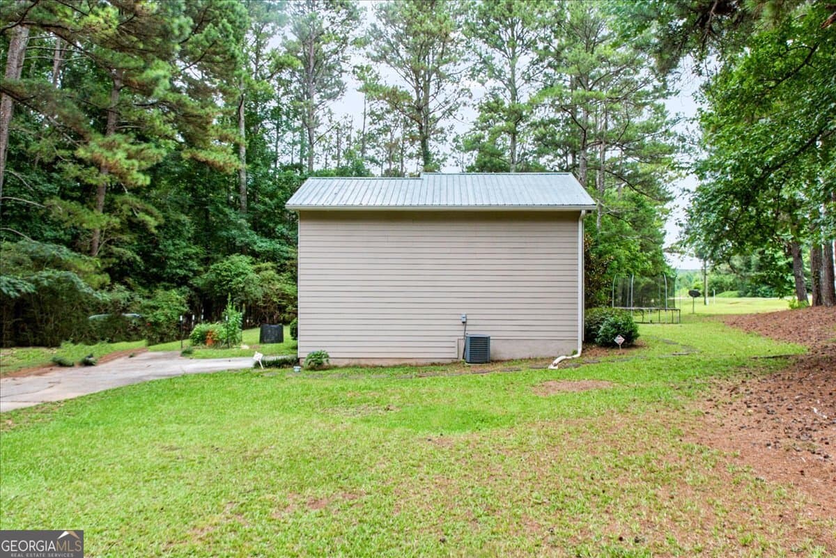 4 bedroom, 2 bathroom, 1,465 sq ft single family residence for sale at 1580 King Mill Road, Mcdonough, GA 30252 — photo 3