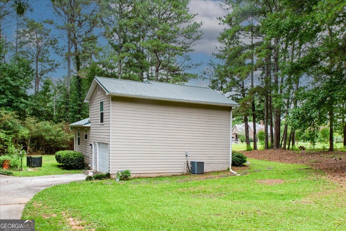 4 bedroom, 2 bathroom, 1,465 sq ft single family residence for sale at 1580 King Mill Road, Mcdonough, GA 30252 — photo 4