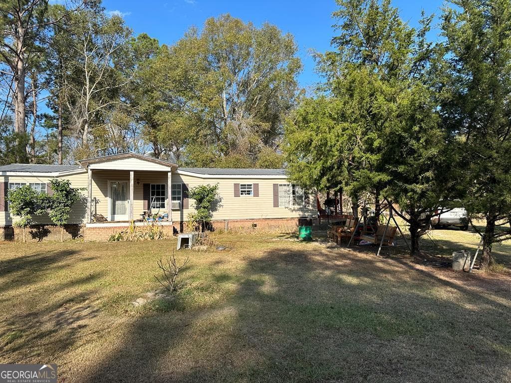 3 bedroom, 2 bathroom mixed use for sale at 686 Victory Circle, Lyons, GA 30436 — photo 7