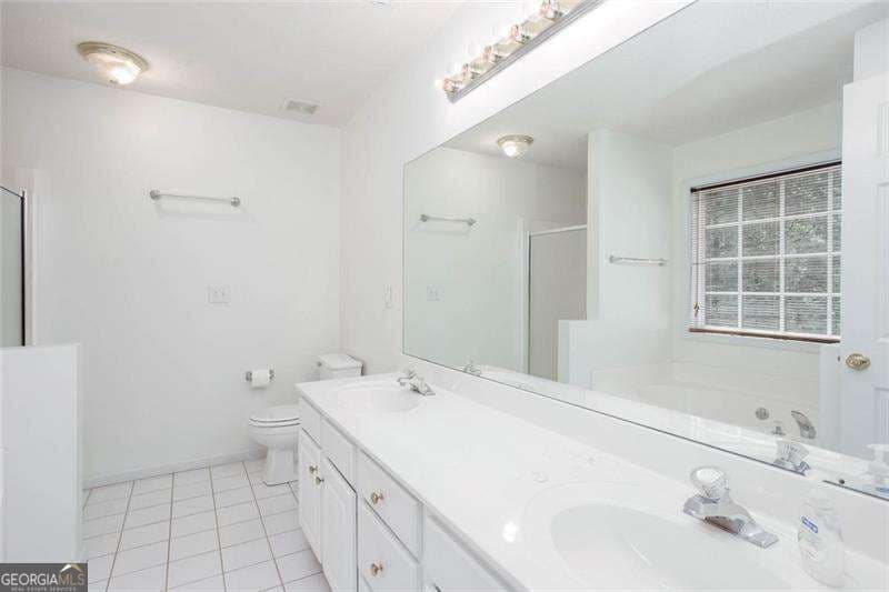 4 bedroom, 3 bathroom, 2,104 sq ft single family residence for sale at 12 Enclave Court, Powder Springs, GA 30127 — photo 3