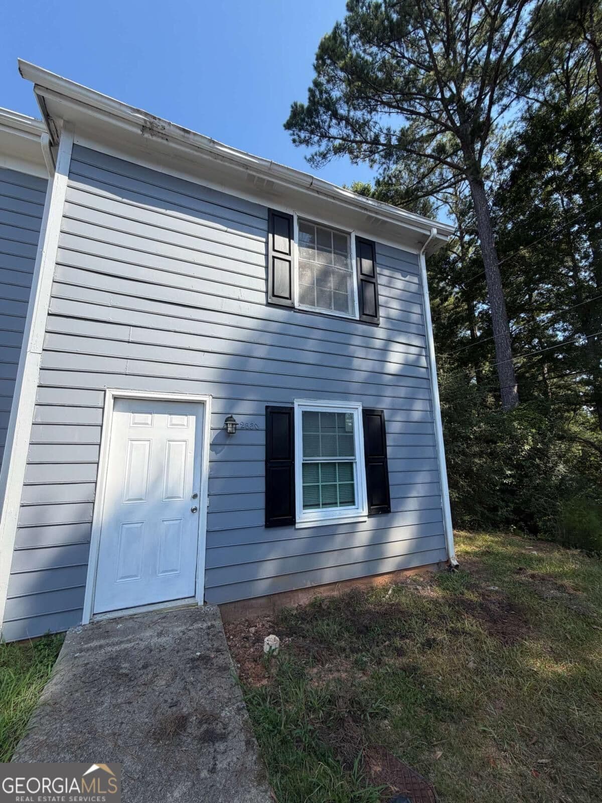 2 bedroom, 1.5 bathroom, 1,024 sq ft townhouse for sale at 2630 Evans Mill Drive, Lithonia, GA 30058 — photo 1 of 9