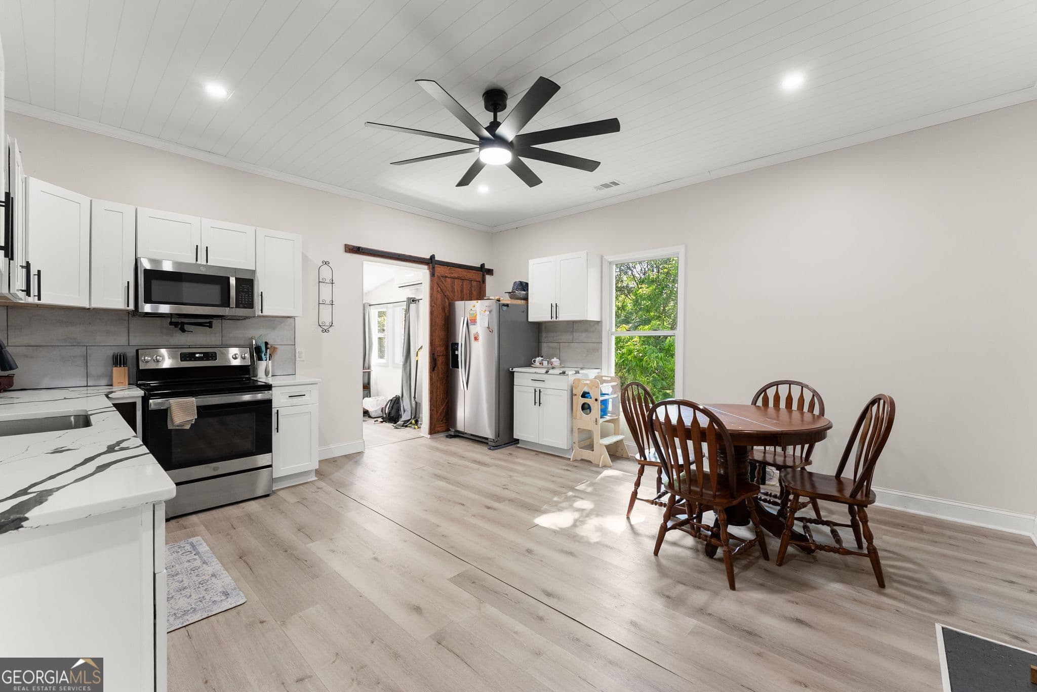 5 bedroom, 4 bathroom, 4,166 sq ft single family residence for sale at 2158 N Broad Street, Commerce, GA 30529 — photo 7