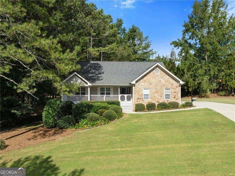 4 bedroom, 3 bathroom, 2,050 sq ft single family residence for sale at 4552 Mulberry Fields Lane, Auburn, GA 30011 — photo 1 of 60