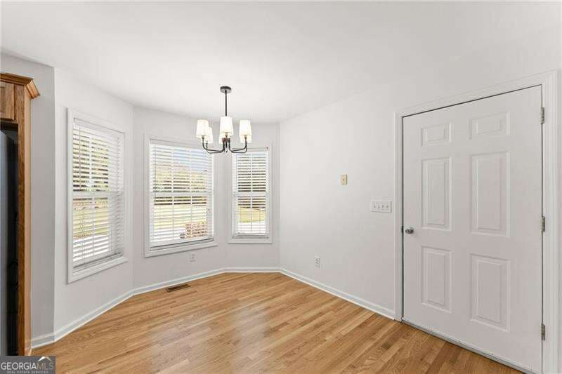 4 bedroom, 3 bathroom, 2,050 sq ft single family residence for sale at 4552 Mulberry Fields Lane, Auburn, GA 30011 — photo 4