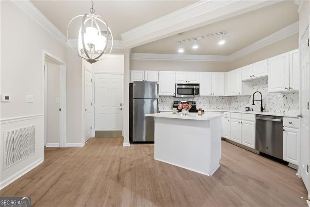 1 bedroom, 1 bathroom, 819 sq ft condominium for sale at 1850 Cotillion Drive 3405, Dunwoody, GA 30338 — photo 1 of 26