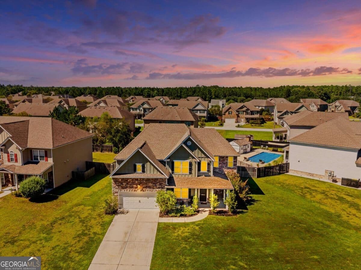 5 bedroom, 4 bathroom, 3,555 sq ft single family residence for sale at 108 Clover Pointe Circle, Guyton, GA 31312 — photo 2