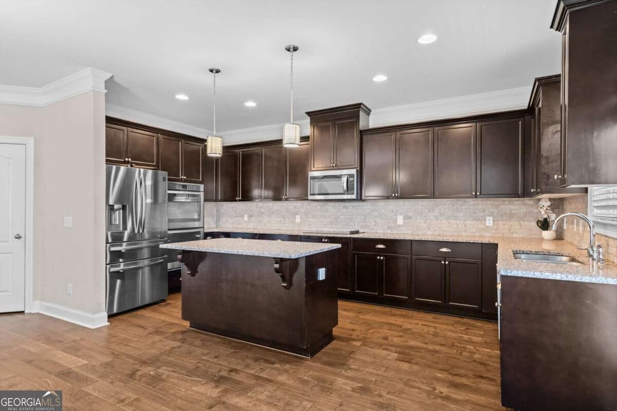 5 bedroom, 4 bathroom, 3,555 sq ft single family residence for sale at 108 Clover Pointe Circle, Guyton, GA 31312 — photo 3