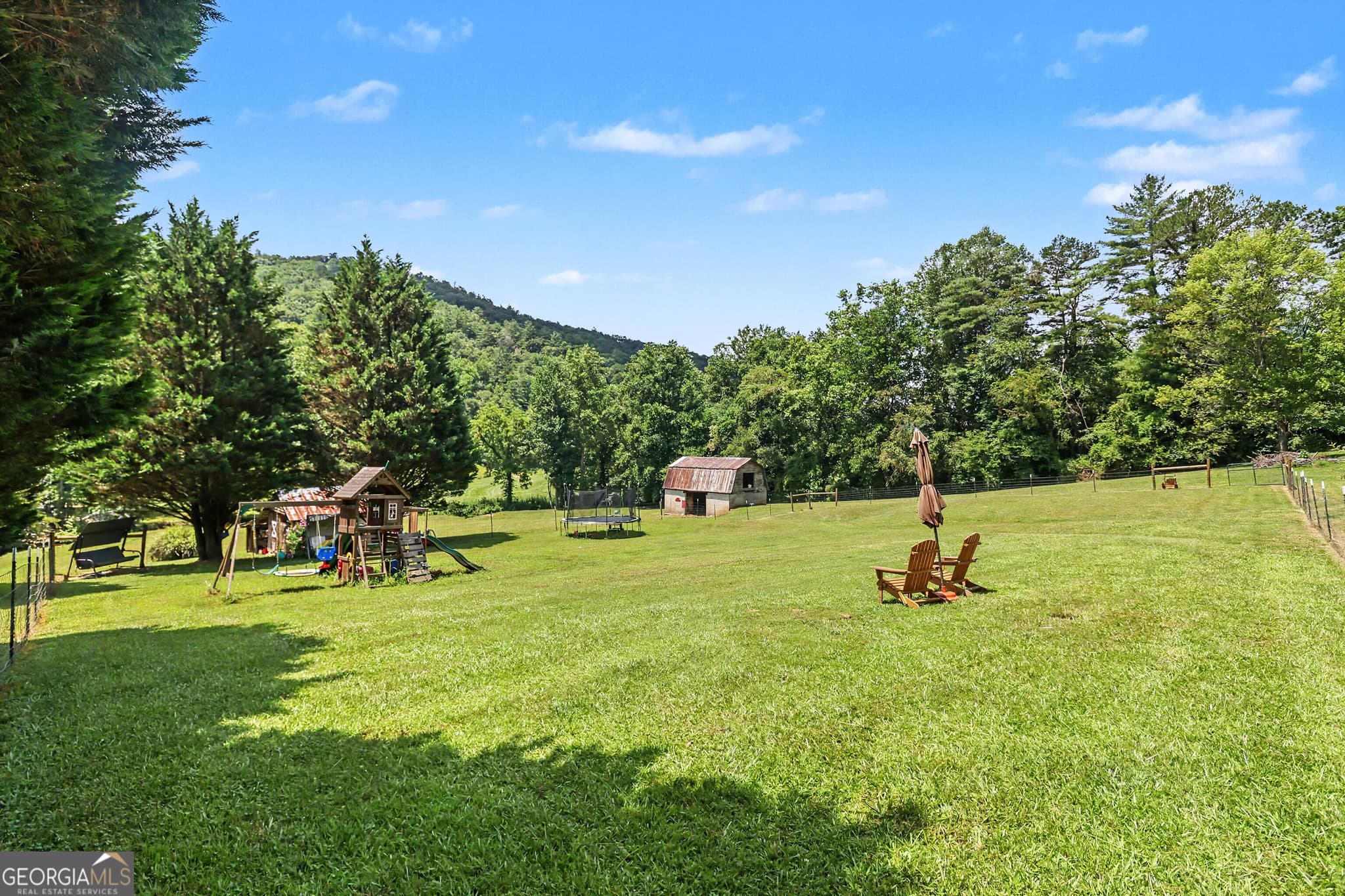 4 bedroom, 3 bathroom, 4,706 sq ft single family residence for sale at 7272 Warwoman Road, Clayton, GA 30525 — photo 6