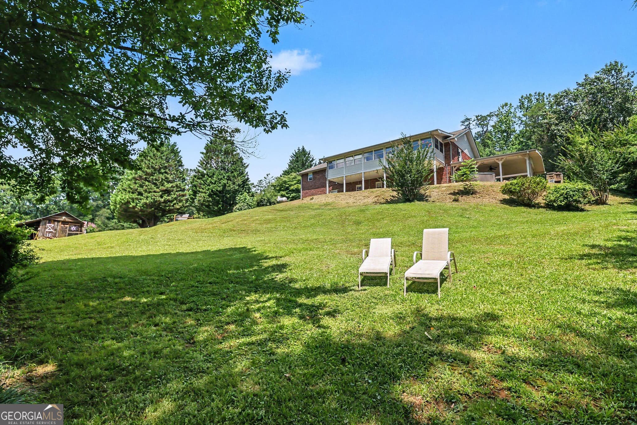 4 bedroom, 3 bathroom, 4,706 sq ft single family residence for sale at 7272 Warwoman Road, Clayton, GA 30525 — photo 1 of 59