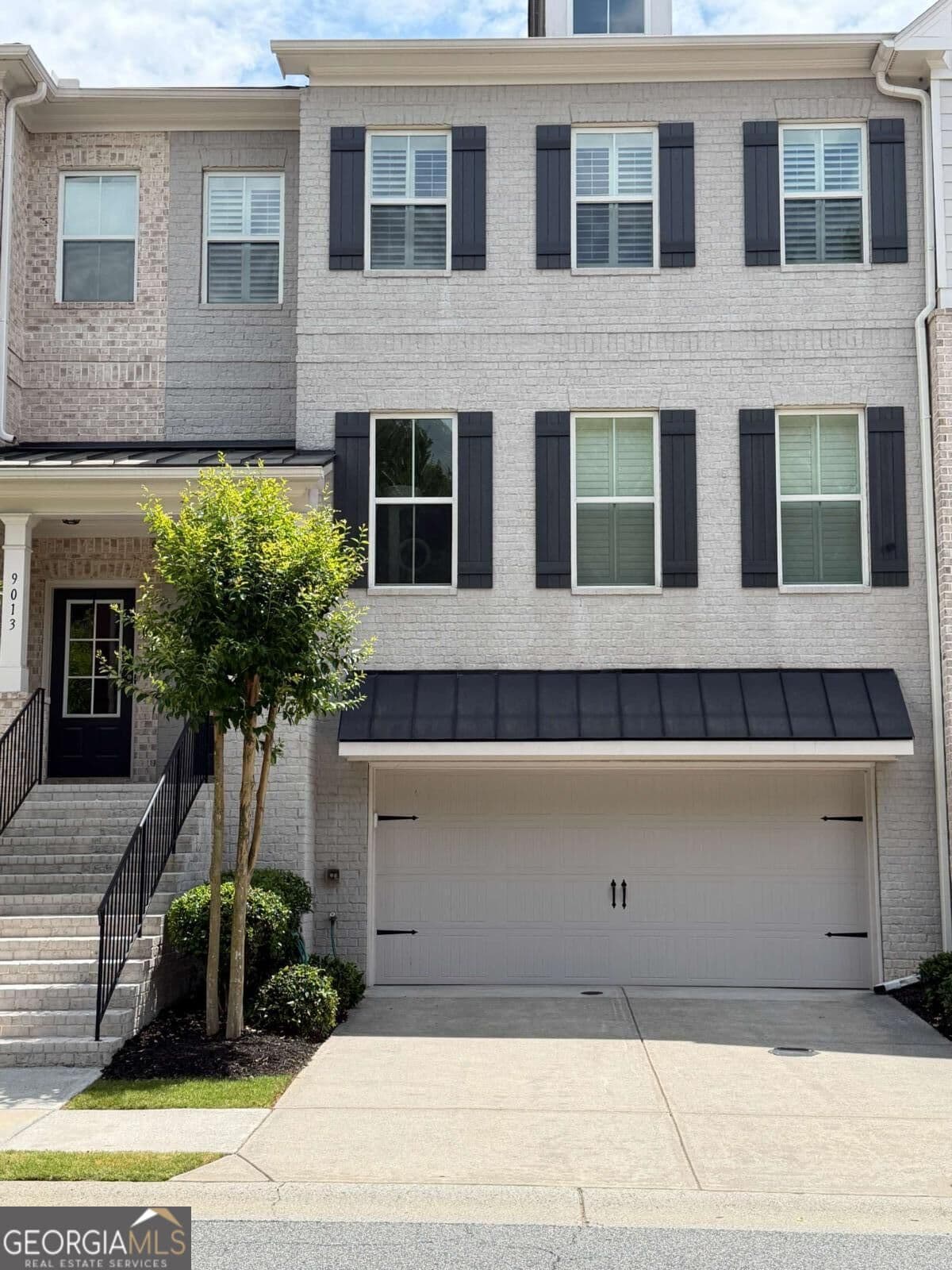 4 bedroom, 3.5 bathroom townhouse for sale at 9015 Woodland Trail 8, Alpharetta, GA 30009