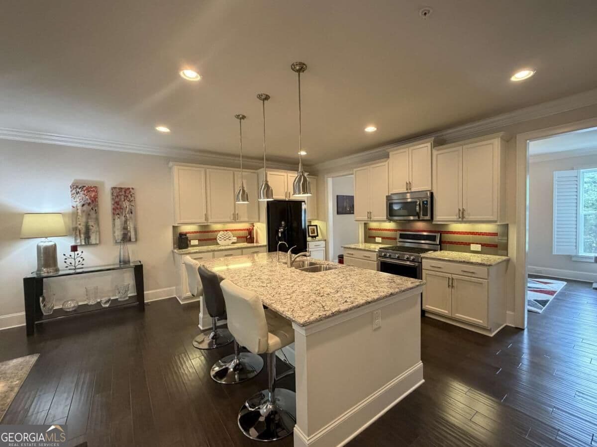 4 bedroom, 3.5 bathroom townhouse for sale at 9015 Woodland Trail 8, Alpharetta, GA 30009 — photo 9